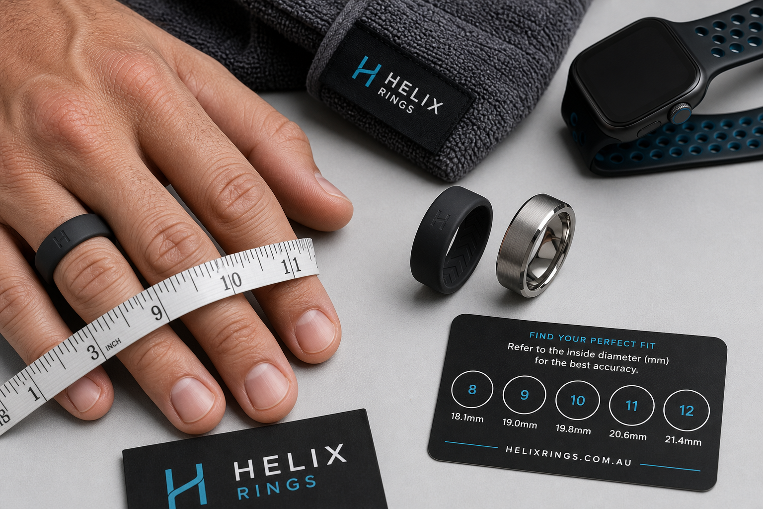 Detail close-up or styled flat-lay of a silicone / titanium / tungsten performance ring on or near an athletic hand with